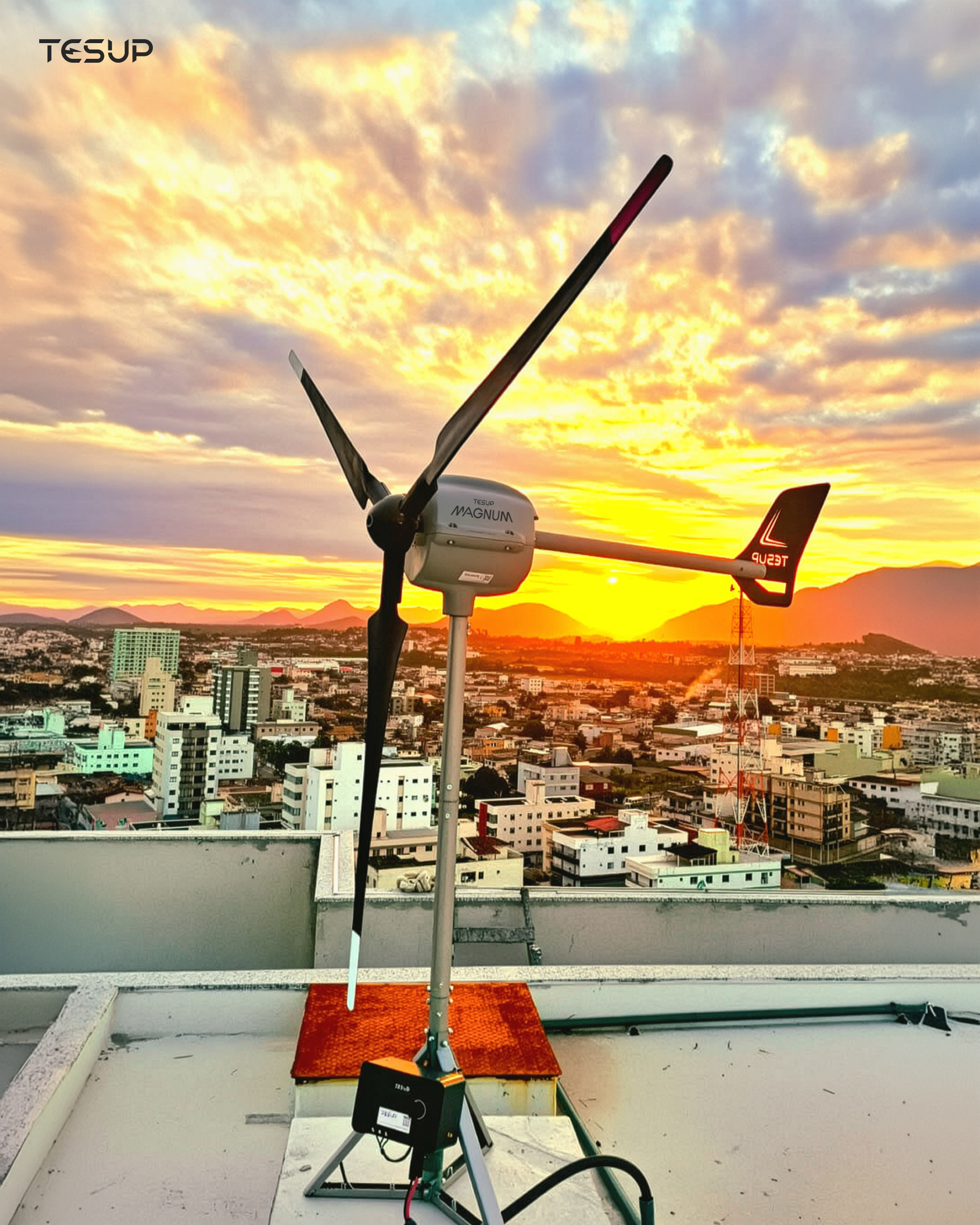 Atlas 10kW rooftop wind turbine with solar panels nearby
